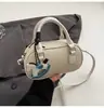 Bolso Boston de Mano con Textura de Grano de Moda para Mujer 2025 Nuevo Estilo Coreano Bolso Cruzado de Nicho Bolso de Hombro para Viajar