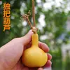 Calabaza natural americana retorcida a mano, silbato de paloma, forma de ajo, de una sola cavidad, pequeña, con un solo asa, coleccionable, de forma extraña, para jugar, y más.