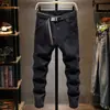 Pantalones Vaqueros Negros con Bolsillo Inclinado y Forro de Polar para Hombre Otoño/Invierno 2023 Nuevos Casual Versátiles Lavados Elásticos Ajustados Skinny