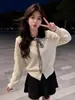 Jaqueta Cardigan de Tricô Gola Boneca Off-White Feminina 2026 Novo Estilo Coreano Preguiçoso Atmosférico Outono Inverno