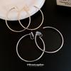 Europa y Estados Unidos arete de clip redondo liso transfronterizo nicho viento frío personalidad aretes moda temperamento aretes sentido de alta gama de lujo ligero