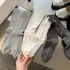 Meias Femininas de Cano Médio Novas Outono/Inverno 2025, Meias Vermelhas Estilo Japonês Ankela, Meias Versáteis de Puxar Venda por Atacado