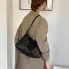Bolsa Saco Textura Tramada Retrô Feminina 2026 Nova Grande Capacidade Moda Versátil Bolsa de Ombro Único para Braço Bolsa Tote de Couro Macio