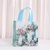 Bolsa de Tela No Tejida Bolsa Tote Navideña Bolsa para Empaque de Regalo con Estampado de Dibujos Animados Bolsa para Dulces de Fiesta al por Mayor