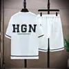 Camiseta de Manga Curta de Verão Casual Traje Esportivo para Homens, Marca Tendência, Corte Amplo, Tamanho Grande, Estampa de Letras Juvenil, Combinação Estilosa