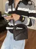 Bolsa de mão simples com laço transfronteiriça para mulheres, nova bolsa elegante e versátil de alta qualidade para ombro e transversal 2026