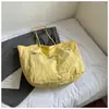 Bolsa Tote Nova Verão 2025 Estilo Coreano Nicho Bolsa Grande de Lona para Mulheres Bolsa de Mão Ombro Nicho Ins