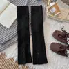 Populares calentadores de piernas de otoño e invierno para mujer con aberturas abotonadas, lana engrosada y cálida, diseño único, cubiertas de piernas de estilo básico