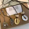 Collar Largo con Colgante de Agujero de Viento Escarchado para Mujer Nuevo Estilo Chino Diseño de Lujo Ligero Cadena de Suéter Deslizante de Gama Alta de Nicho