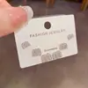 Moda Japonesa Coreana Simple Circonita Letra M Pendientes de Botón de Tres Piezas Exquisitos Pequeños Versátiles Tacto de Alta Gama Pendientes Súper Brillantes para Mujeres