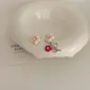 Aguja de Plata de Ley S925 Zircón Rosa Agujeros para las Orejas Pendientes de Botón para Mujer 2025 Nuevo Nicho Sentido Avanzado Pendientes Libres para Dormir