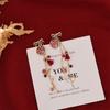 Pendientes de borlas rojas de la fortuna del Año Nuevo chino, pendientes largos con temperamento femenino, diseño de nicho, pendientes únicos y dulces de Año Nuevo.
