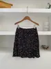 Falda de línea A floral nueva Primavera/Verano 2026 Moda coreana francesa plisada de cintura alta adelgazante corta falda de media longitud moderna