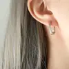 Moda tendencia francesa temperamento piedra ojo de tigre perla de imitación ágata verde aretes en forma de U aretes de acero de titanio joyería para mujer fábrica