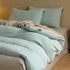 Juego de cuatro piezas de algodón puro cepillado de lujo ligero para otoño e invierno, juego de ropa de cama de tres piezas de color liso bicolor de algodón cálido y grueso