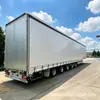 Exportación transfronteriza semirremolque tipo caja con cortina lateral de 5 ejes vehículo de transporte logístico de contenedores camión de plataforma para transporte de larga distancia