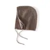 Nuevo gorro de punto de cachemira liso para otoño e invierno para mujer, con protección para las orejas, cordón y un diseño de estilo coreano que es versátil y te mantiene abrigada.