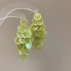 Pendientes de borla de flor de cuentas de color dopamina para primavera, sensación de lujo ligero y alta gama, pendientes atmosféricos estilo vacacional para mujer