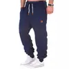 2023 nuevos pantalones deportivos de entrenamiento de costura para hombre de otoño e invierno, leggings, pantalones de fitness deportivos para hombre
