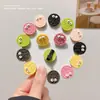 Juguete de Comida Simulada Galleta de Ojos Grandes Pinza para el Cabello Dulce y Divertida Color Caramelo Accesorios para el Cabello de Estudiante Pinza Lateral para Niños Divertida Japonesa y Coreana