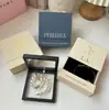 Caja de uñas de moda de nicho en stock logo dorado pendientes collar almacenamiento de joyas caja con cajón de exhibición