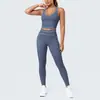 Conjunto de outfit de yoga ajustado con diseño deportivo en la espalda, de tela cepillada con bloques de color transfronterizos, sensación nude, pantalones largos de cintura alta para levantar glúteos para correr y fitness
