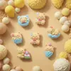 Oso Mantequilla Dibujo Animado Lindo Pegamento de Crema DIY Pasador Llavero Parche para Refrigerador Funda para Teléfono Celular Joyería al por Mayor