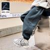 Pantalones deportivos casuales de invierno grises para niños 2025 Nuevos pantalones holgados gruesos de otoño e invierno para niños