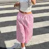 Estilo INS transfronterizo europeo y americano Leopardo rosa dulce y fresco estampado pantalones de chándal de otoño de cintura alta con cordón sueltos de pierna ancha callejeros