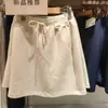 Saia curta casual de secagem rápida para mulheres, novo modelo versátil de outono 2026, saia reta fashion com cintura elástica 492915
