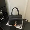Bolso de Mano Pequeño Cuadrado Simple y Elegante Estilo Coreano para Mujer 2026 Nuevo Bolso de Hombro Versátil Casual Bolso Cruzado de Moda para Viaje