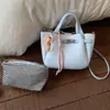 Tendencia de Moda de Primavera 2026 Transfronteriza Bolso Cruzado de Un Hombro Bolso Cubo Casual Simple de Mano Bolso para Mujer