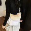 Bolsa Exclusiva de Cor Pura para Mulheres 2025 Nova Popular de Verão Grande Capacidade Bolsa Transversal Bolsa de Ombro Chifre Bolsa de Axila