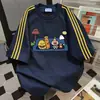 Camiseta de Manga Corta con Estampado de Dibujos Animados Divertidos y Diseño Color-Blocking 2026 Verano Nuevo Versátil de Estilo Vintage