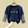 Camiseta de manga larga de algodón puro para niño 2026 primavera y otoño nueva elegante de dibujos animados estilo dos piezas falsas camiseta base de primavera para niño