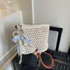Bolso de mano tejido hueco transfronterizo, bolso cuadrado pequeño con un ambiente relajado, perfecto para vacaciones en la playa, bolso cruzado para teléfono, bolso de paja con temática de bosque