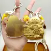 Colgante de Oro Puro 999 Dios de la Riqueza Souvenir Colgante para Bolso de Teléfono Móvil Llavero Concha de Agua Oro Regalo de Vacaciones Venta al por Mayor