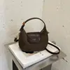 Bolso de Mano Retro de Nicho Mate Otoño e Invierno para Mujer 2026 Nuevo Bolso Cruzado Versátil Bolso Tote Pequeño de Mano Súper Caliente Exquisito
