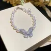 Pulsera de perlas con lazo de doble capa estilo vintage francés, diseño único y versátil, joyería de lujo ligero y de alta gama