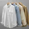 Camisa de trabajo de manga larga resistente estilo americano para hombre, nuevo modelo de primavera y otoño con bolsillos, chaqueta camisa casual de negocios de alta gama para hombre