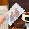 Salón de Jade Escuchando la Primavera: Nuevos Pendientes Clásicos Estilo Chino Flor de Calabaza, Diseño Largo, Pendientes de Estilo Nacional de Lujo Ligero de Nicho, Chapados en Cobre