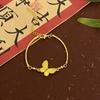 Pulsera ligera de lujo con esmalte dorado antiguo, exquisita pulsera de estilo artístico de alta gama, elegante y combinable con todo.