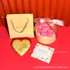 Oro Puro 999 Creativo 520 Qixi Exquisita Moneda de Oro en Forma de Corazón Set de Regalo Decoración del Día de San Valentín Personalizado Venta al por Mayor