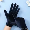 Guantes de terciopelo dorado para mujer de otoño e invierno guantes de terciopelo elástico guantes cálidos para montar al aire libre para conducir al por mayor
