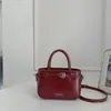 Bolso plateado para mujer 2026 nuevo de moda primavera-verano bolso de mano de alta gama bolso tipo cubo para el uso diario bolso de hombro y cruzado