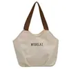 Bolsa de mão simples e casual estilo coreano e japonês, bolsa de lona plissada versátil, moderna e artística para trabalho, deslocamento e armazenamento de lancheira
