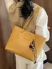 Colección de otoño 2026 transfronteriza: bolsa de mano grande, moderna, para mujer, adecuada para ir al trabajo, bolso versátil y bolso de hombro