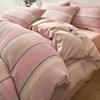 Juego de cama de cuatro piezas de algodón teñido con hilo gofrado estilo nórdico, sábana, funda de edredón de algodón de tres piezas para dormitorio de estudiantes