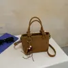 Outono de 2026 Nova Bolsa de Mão Estilo Coreano Simples Moda Elegante Bolsa de Balde Texturizada Elegante Bolsa de Ombro Único Bolsa Transversal