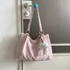 Bolso de mano retro, artístico y de diseño nicho, con un estilo preppy, un bolso de hombro nuevo y moderno, minimalista y de gran capacidad para mujer